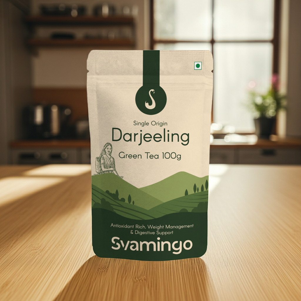 Darjeeling green tea package from svamingo on a wooden surface with a kitchen background