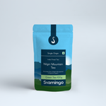 Svamingo Nilgiri green tea pouch 100g on a plain surface and clean background