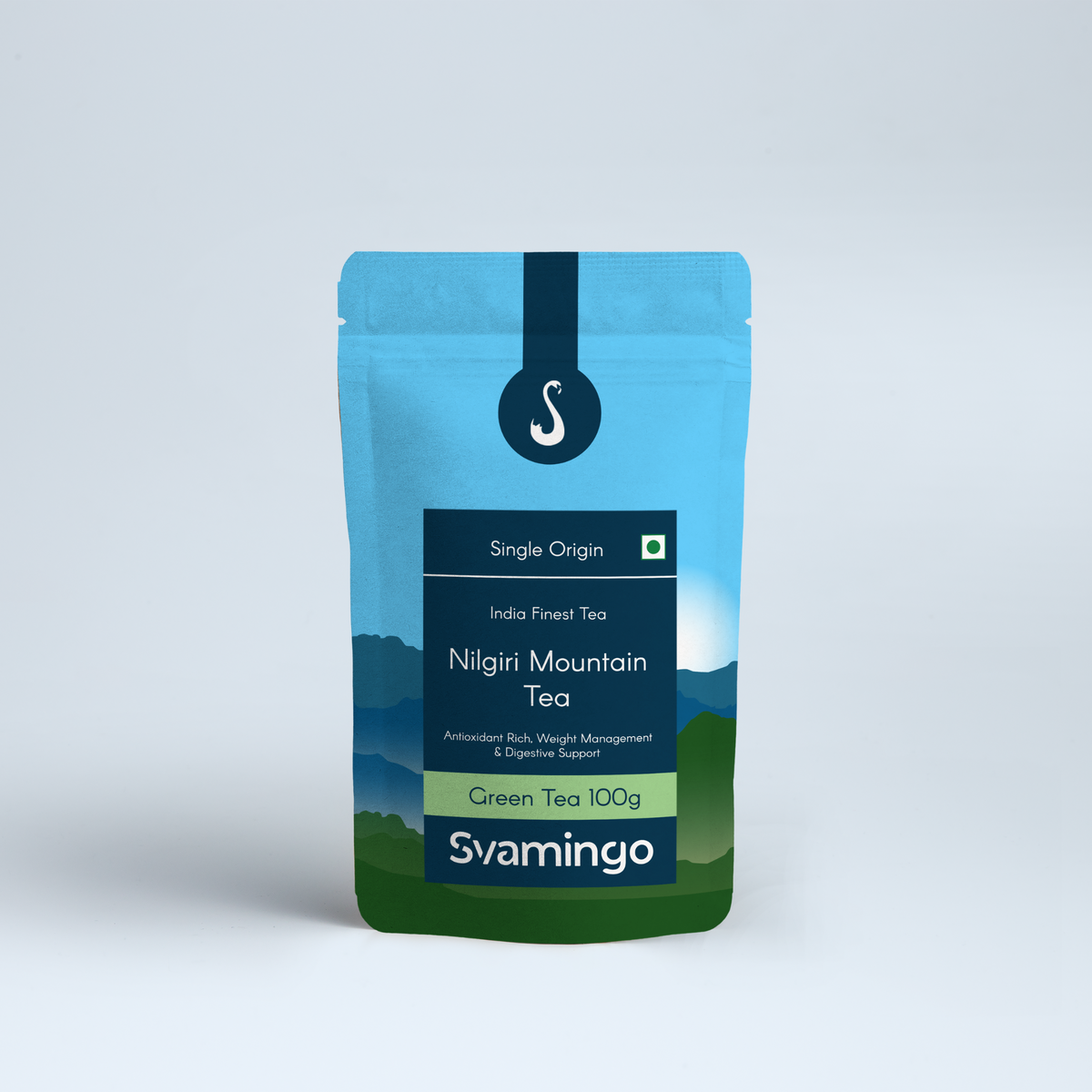 Svamingo Nilgiri green tea pouch 100g on a plain surface and clean background